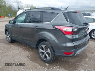 2017 Ford Escape SE with VIN 1FMCU9GD4HUE45193, listed as a IAAI auction lot 42055861 with 154,961 mi miles and . Bid and sale history available at DreamBid. Image 3.