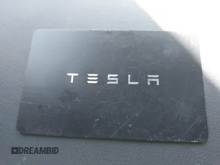2022 Tesla Model Y Long Range with VIN 7SAYGDEE1NF402745, listed as a IAAI auction lot 41493850 with 11,222 mi miles and . Bid and sale history available at DreamBid. Image 11.