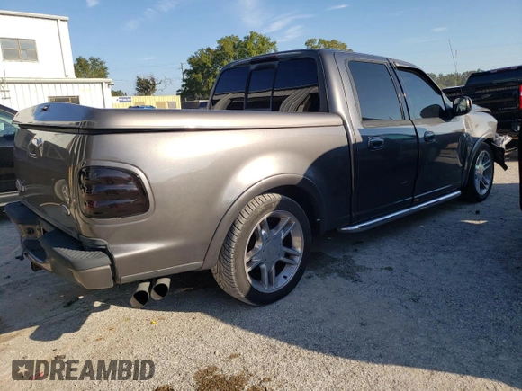2002 Ford F-150 Harley Davidson with VIN 1FTRW07392KD46352, listed as a Copart auction lot 73463924 with 135,813 mi miles and Salvage Title. Bid and sale history available at carsss.com. Image 3.