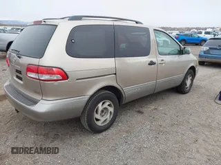 2002 Toyota Sienna LE with VIN 4T3ZF13C42U418853, listed as a IAAI auction lot 41248253 with 193,986 mi miles. Bid and sale history available at carsss.com. Image 4.