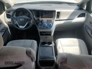 2015 Toyota Sienna LE AAS with VIN 5TDKK3DC9FS609084, listed as a Copart auction lot 57055295 with 247,531 mi miles and Salvage title. Bid and sale history available at DreamBid. Image 8.