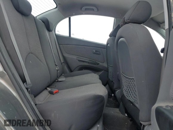 2010 Kia Rio with VIN KNADH4B33A6617736, listed as a Copart auction lot 45469215 with 233,539 mi miles and Clean Title. Bid and sale history available at DreamBid. Image 10.