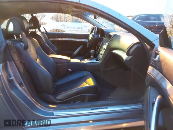 2013 Infiniti G37 Convertible with VIN JN1CV6FE8DM772784, listed as a IAAI auction lot 41367692 with 90,808 mi miles. Bid and sale history available at carsss.com. Image 5.