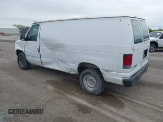 2006 Ford Econoline Cargo with VIN 1FTNE24W86DA21116, listed as a IAAI auction lot 42142204 with 133,272 mi miles and . Bid and sale history available at DreamBid. Image 3.