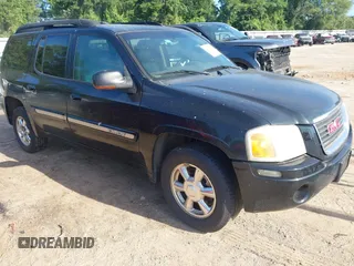 2003 GMC Envoy SLT with VIN 1GKES16S236165956, listed as a IAAI auction lot 42602816 with 211,268 mi miles and . Bid and sale history available at DreamBid. Image 1.
