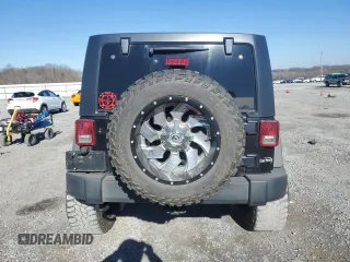 2014 Jeep Wrangler Unlimited Sport with VIN 1C4BJWDG8EL261074, listed as a Copart auction lot 87631195 with 163,225 mi miles and Salvage Title. Bid and sale history available at carsss.com. Image 6.