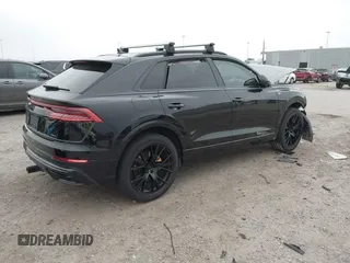 2021 Audi Q8 Premium Plus z VIN WA1EVAF14MD003053, wystawiony jako IAAI lot #41854362 z przebiegiem 32 412 mil mil oraz . Historia ofert i sprzedaży dostępna na DreamBid. Obrazek 4.