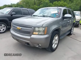 2007 Chevrolet Tahoe LTZ with VIN 1GNFC13J37J399493, listed as a IAAI auction lot 42656195 with 231,950 mi miles and . Bid and sale history available at DreamBid. Image 2.