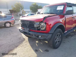 2021 Ford Bronco with VIN 1FMDE5BH8MLA79307, listed as a IAAI auction lot 41590912 with 27,196 mi miles. Bid and sale history available at carsss.com. Image 6.