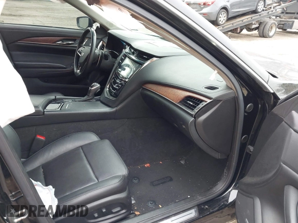 2016 Cadillac CTS Luxury Collection AWD with VIN 1G6AX5SS9G0194228, listed as a IAAI auction lot 41504476 with 94,573 mi miles and . Bid and sale history available at DreamBid. Image 5.