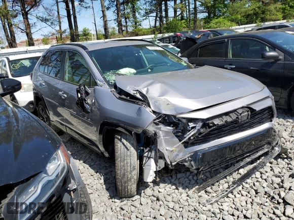 2023 Toyota RAV4 Hybrid SE with VIN JTM16RFV7PD100111, listed as a Copart auction lot 56682135 with 32,198 mi miles and Salvage title. Bid and sale history available at DreamBid. Image 4.