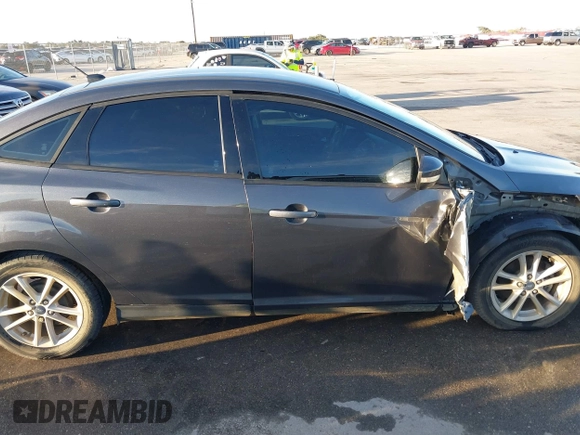2017 Ford Focus SE with VIN 1FADP3F23HL342081, listed as a IAAI auction lot 41278282 with 88,572 mi miles. Bid and sale history available at carsss.com. Image 13.