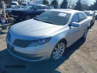 2013 Lincoln MKS EcoBoost with VIN 1LNHL9FT9DG613100, listed as a IAAI auction lot 41614096 with 207,789 mi miles. Bid and sale history available at carsss.com. Image 17.