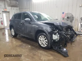 2014 Mazda CX-5 Sport z VIN JM3KE4BE2E0371864, wystawiony jako Copart lot #47225335 z przebiegiem 157 483 mil mil oraz Szkoda całkowita • Salvage title. Historia ofert i sprzedaży dostępna na DreamBid. Obrazek 4.