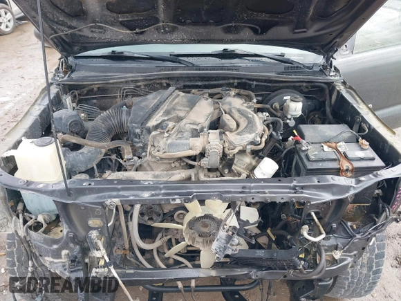 2013 Toyota Tacoma with VIN 3TMLU4EN7DM113315, listed as a IAAI auction lot 41938415 with 228,912 mi miles and . Bid and sale history available at DreamBid. Image 10.