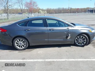 2017 Ford Fusion SE with VIN 3FA6P0H70HR107252, listed as a IAAI auction lot 42041332 with 121,255 mi miles. Bid and sale history available at carsss.com. Image 13.