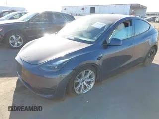 2023 Tesla Model Y Long Range with VIN 7SAYGAEEXPF714760, listed as a IAAI auction lot 41748398 with 49,802 mi miles and . Bid and sale history available at DreamBid. Image 18.