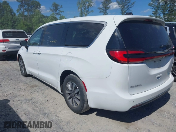 2024 Chrysler Pacifica Hybrid Select z VIN 2C4RC1S72RR117788, wystawiony jako IAAI lot #42318543 z przebiegiem 21 855 mil mil oraz . Historia ofert i sprzedaży dostępna na DreamBid. Obrazek 3.