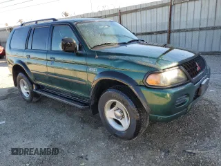 2001 Mitsubishi Montero ES z VIN JA4LS21H01P043215, wystawiony jako Copart lot #77391904 z przebiegiem 148 705 mil mil oraz Tytuł czysty. Historia ofert i sprzedaży dostępna na DreamBid. Obrazek 4.