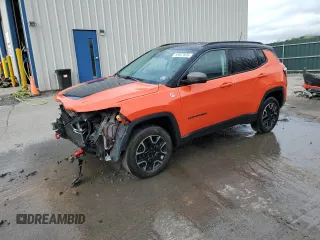 2018 Jeep Compass Trailhawk with VIN 3C4NJDDB5JT483091, listed as a Copart auction lot 55607835 with 76,066 mi miles and Salvage title. Bid and sale history available at DreamBid. Image 1.