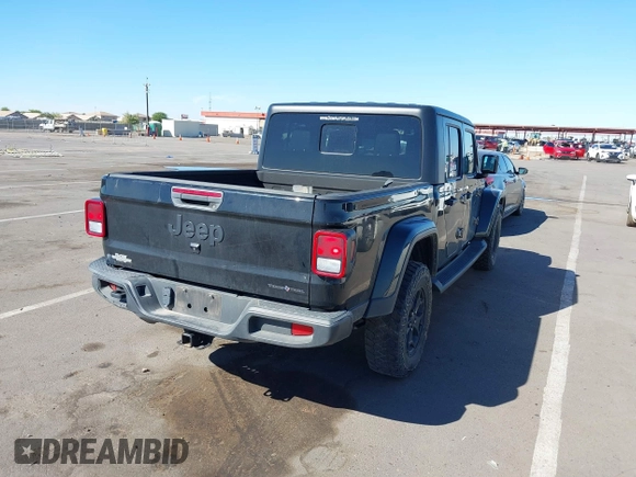 2022 Jeep Gladiator Texas Trail with VIN 1C6HJTAG7NL128584, listed as a IAAI auction lot 40630493 with Not Provided miles and . Bid and sale history available at DreamBid. Image 4.
