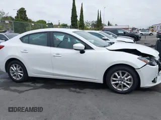 2016 Mazda 3 i Grand Touring z VIN 3MZBM1X78GM265081, wystawiony jako IAAI lot #42108064 z przebiegiem 38 633 mil mil oraz . Historia ofert i sprzedaży dostępna na DreamBid. Obrazek 13.
