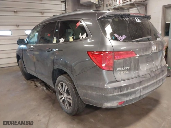 2016 Honda Pilot EX-L with VIN 5FNYF6H55GB103141, listed as a IAAI auction lot 41535841 with 129,231 mi miles. Bid and sale history available at carsss.com. Image 3.