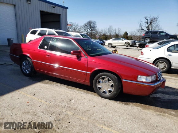 2002 Cadillac Eldorado z VIN 1G6EL12Y02B101569, wystawiony jako Copart lot #46216994 z przebiegiem 94 758 mil mil oraz Szkoda całkowita • Salvage title. Historia ofert i sprzedaży dostępna na DreamBid. Obrazek 4.