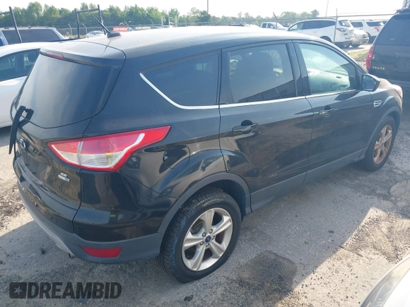 2013 Ford Escape SE with VIN 1FMCU9GX1DUC40662, listed as a IAAI auction lot 42158818 with 115,953 mi miles and . Bid and sale history available at DreamBid. Image 4.