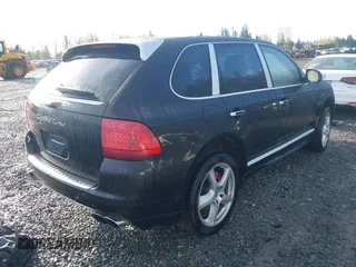 2005 Porsche Cayenne Turbo with VIN WP1AC29P25LA92448, listed as a IAAI auction lot 41976442 with 119,893 mi miles. Bid and sale history available at carsss.com. Image 4.