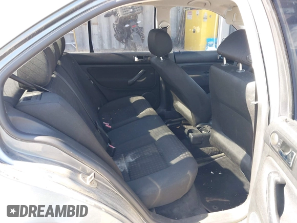 2003 Volkswagen Jetta GL z VIN 3VWRK69M43M117878, wystawiony jako IAAI lot #42553211 z przebiegiem 183 524 mil mil oraz . Historia ofert i sprzedaży dostępna na DreamBid. Obrazek 8.