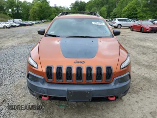 2016 Jeep Cherokee Trailhawk with VIN 1C4PJMBS2GW255368, listed as a Copart auction lot 59010305 with 105,667 mi miles and Salvage title. Bid and sale history available at DreamBid. Image 5.