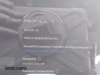 2022 Tesla Model 3 with VIN 5YJ3E1EA7NF314744, listed as a IAAI auction lot 42057596 with 30,936 mi miles and . Bid and sale history available at DreamBid. Image 15.