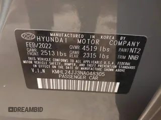 2022 Hyundai Sonata Hybrid Blue with VIN KMHL24JJ3NA048305, listed as a IAAI auction lot 41572735 with 88,085 mi miles. Bid and sale history available at carsss.com. Image 9.