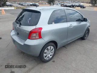 2007 Toyota Yaris with VIN JTDJT923675117537, listed as a IAAI auction lot 42116893 with 210,036 mi miles. Bid and sale history available at carsss.com. Image 4.