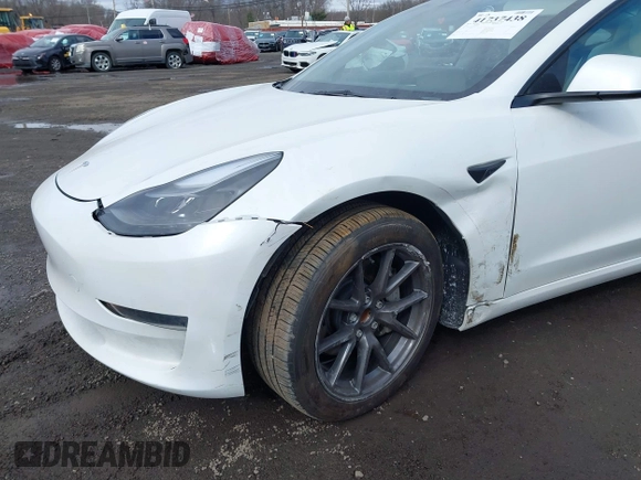 2023 Tesla Model 3 z VIN 5YJ3E1EA8PF671613, wystawiony jako IAAI lot #41737438 z przebiegiem 21 405 mil mil oraz . Historia ofert i sprzedaży dostępna na DreamBid. Obrazek 6.