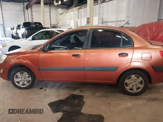 2009 Kia Rio LX with VIN KNADE223796547229, listed as a IAAI auction lot 41947371 with 153,061 mi miles and . Bid and sale history available at DreamBid. Image 14.