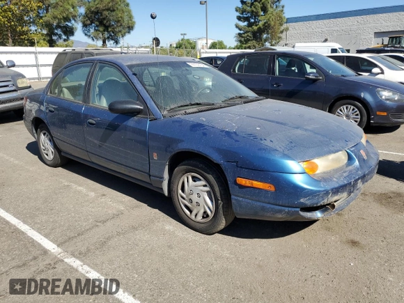 2001 Saturn SL z VIN 1G8ZF52861Z275529, wystawiony jako Copart lot #74153154 z przebiegiem 171 272 mil mil oraz Tytuł czysty. Historia ofert i sprzedaży dostępna na DreamBid. Obrazek 4.