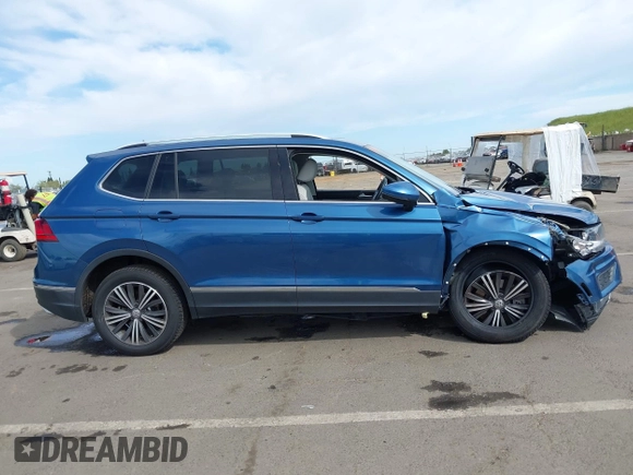 2019 Volkswagen Tiguan SE with VIN 3VV3B7AX2KM064568, listed as a IAAI auction lot 42008754 with 53,132 mi miles and . Bid and sale history available at DreamBid. Image 13.
