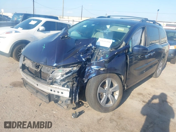 2019 Honda Odyssey EX-L with VIN 5FNRL6H75KB054465, listed as a IAAI auction lot 41841488 with 141,790 mi miles. Bid and sale history available at carsss.com. Image 2.