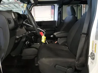 2018 Jeep Wrangler JK Unlimited Sport with VIN 1C4BJWDG7JL814436, listed as a Copart auction lot 45557095 with 67,755 mi miles and Salvage Title. Bid and sale history available at carsss.com. Image 7.