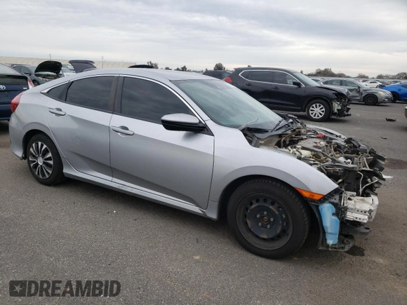 2019 Honda Civic Sedan LX with VIN 19XFC2F61KE200100, listed as a Copart auction lot 37959484 with 131,847 mi miles and Salvage Title. Bid and sale history available at carsss.com. Image 4.