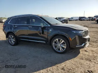 2024 Cadillac XT6 FWD Premium Luxury with VIN 1GYKPCRS7RZ709179, listed as a Copart auction lot 52251305 with 19,442 mi miles and Salvage title. Bid and sale history available at DreamBid. Image 4.