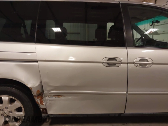 2004 Honda Odyssey EX-L with VIN 5FNRL18974B127696, listed as a IAAI auction lot 41643243 with 200,286 mi miles and . Bid and sale history available at DreamBid. Image 6.
