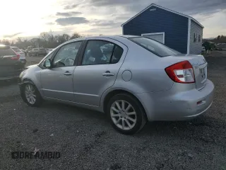 2011 Suzuki SX4 LE with VIN JS2YC5A23B6300189, listed as a Copart auction lot 85389574 with 71,272 mi miles and Clean Title. Bid and sale history available at carsss.com. Image 2.