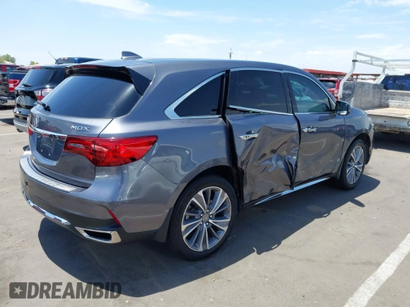 2018 Acura MDX Technology with VIN 5J8YD3H53JL007552, listed as a IAAI auction lot 42648090 with 58,706 mi miles and . Bid and sale history available at DreamBid. Image 4.