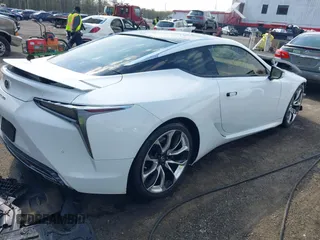2021 Lexus LC with VIN JTHBP5AY0MA008376, listed as a IAAI auction lot 42016674 with 37,760 mi miles. Bid and sale history available at carsss.com. Image 4.