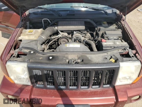 2009 Jeep Commander Sport z VIN 1J8HH48K79C501349, wystawiony jako Copart lot #62368885 z przebiegiem 191 923 mil mil oraz Szkoda całkowita • Salvage title. Historia ofert i sprzedaży dostępna na DreamBid. Obrazek 12.