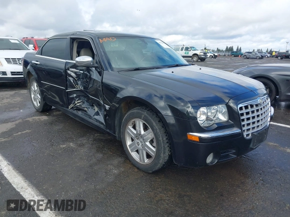 2006 Chrysler 300 C with VIN 2C3LK63H66H142437, listed as a IAAI auction lot 41751890 with 57,374 mi miles. Bid and sale history available at carsss.com. Image 1.