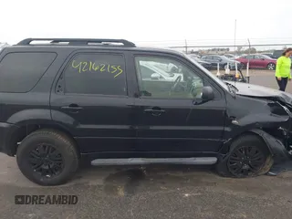 2005 Mercury Mariner Luxury z VIN 4M2CU57115DJ33938, wystawiony jako IAAI lot #42162155 z przebiegiem 174 834 mil mil oraz . Historia ofert i sprzedaży dostępna na DreamBid. Obrazek 13.